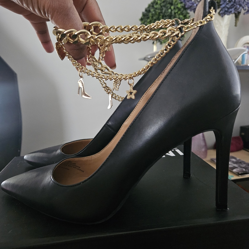 Elegant Black High Heels with Gold Chain Detail